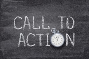 call to action written on a black board with a stopwatch as the O