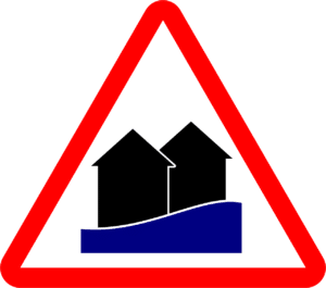 houses with water rising in a large red triangle sign