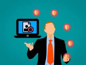 illustration of a person in a suit with a laptop and shields around it