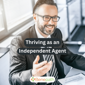 thriving as an independent agent text overlaying image of a smiling insurance agent