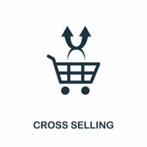 cross selling text overlaying image of a shopping cart with crossed arrows coming out of it