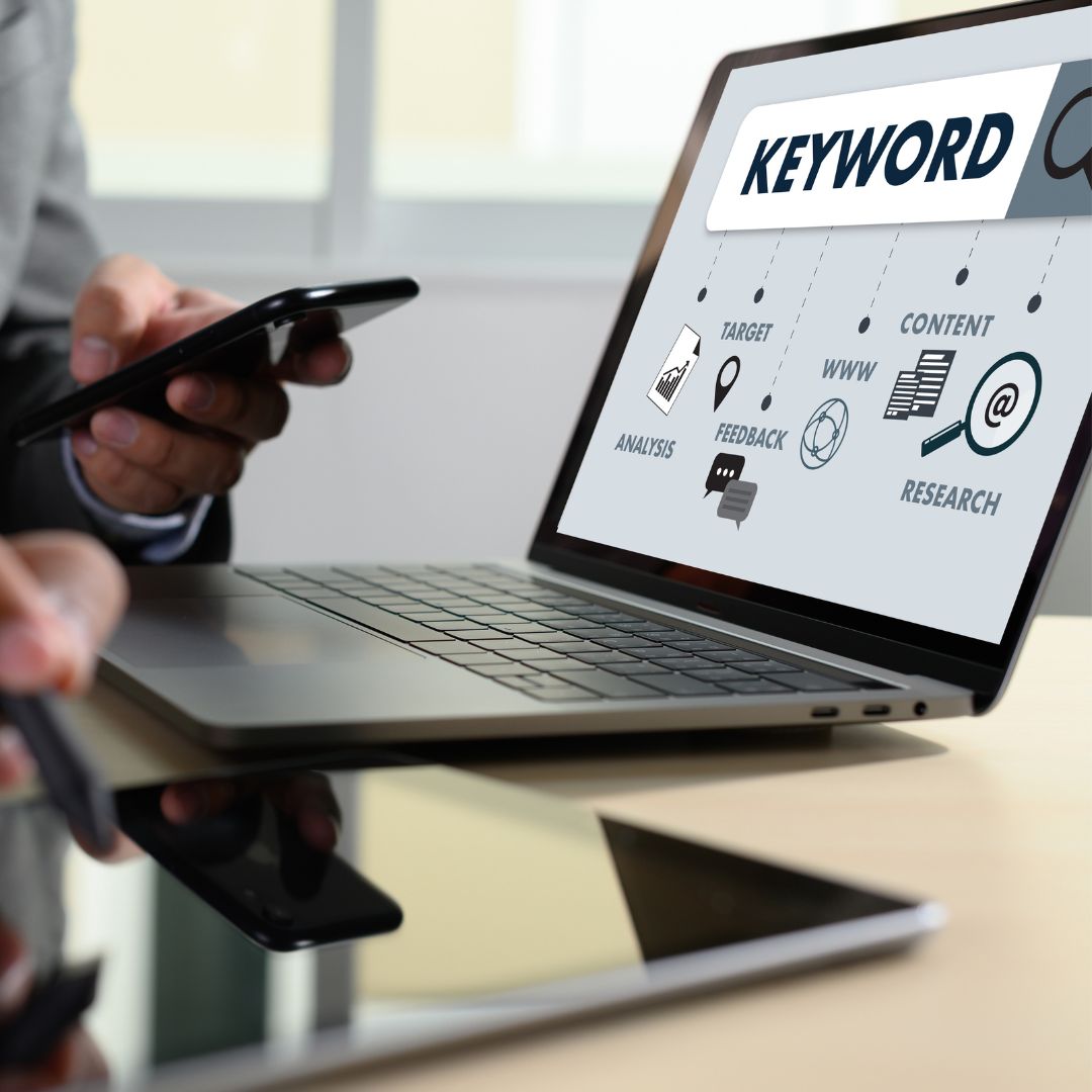 Keyword research concept displayed on a laptop screen, emphasizing SEO strategies, content optimization, and digital marketing