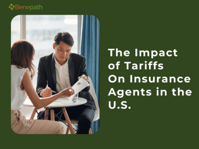 Two professionals discussing insurance documents, representing the impact of U.S. tariffs on insurance agents, with Benepath branding.