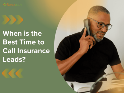 A smiling professional man talks on the phone while working at his desk, with the text “When is the Best Time to Call Insurance Leads?"